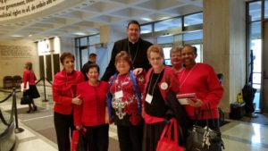 Back row: Bishop Gregory Parkes. Left to right: Cathy Pena, SPDCCW 1st VP, Member Sonia Loughlin, Gail Merrill, 1st VP, Our Lady of Life District, Patricia Hanson, SPDCCW Immediate Past President, Beth Aubin. SPDCCW 2nd VP, Sonia Tumming, SPDCCW Recording Secretary